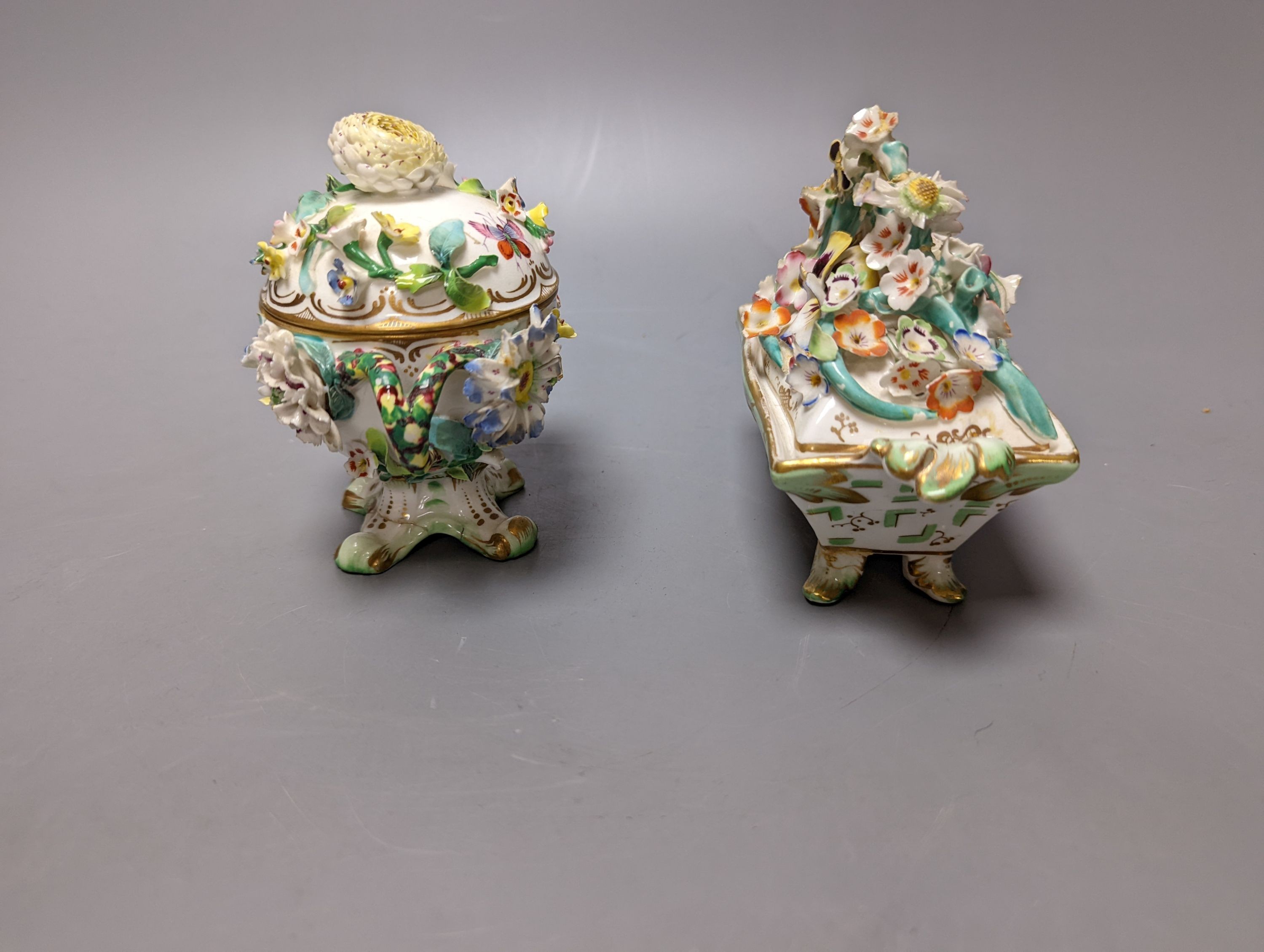 A Meissen style chocolate cup and cover, two mid 19th century English porcelain flower encrusted pots and covers and two dishes